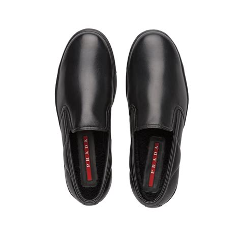 prada leather slip ons